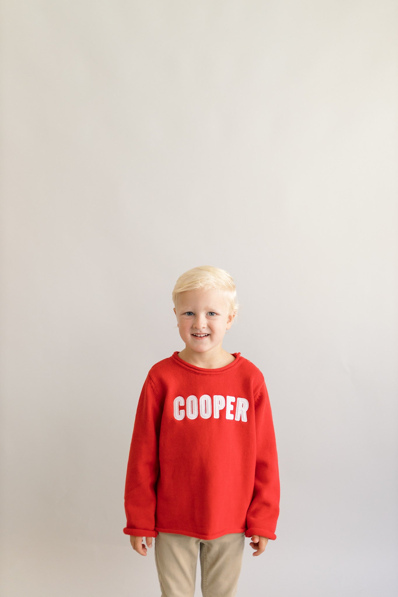 Red roll neck sweater