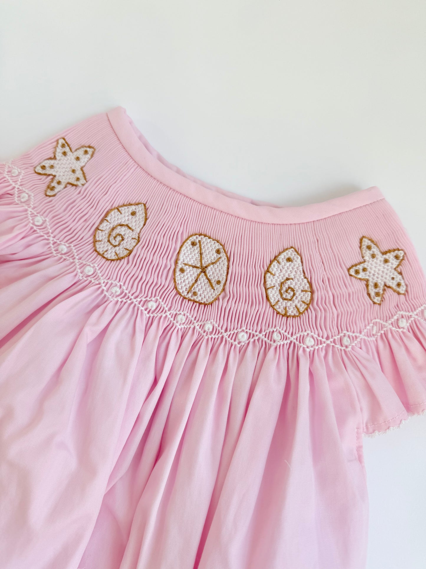 Pink smocked shell dress