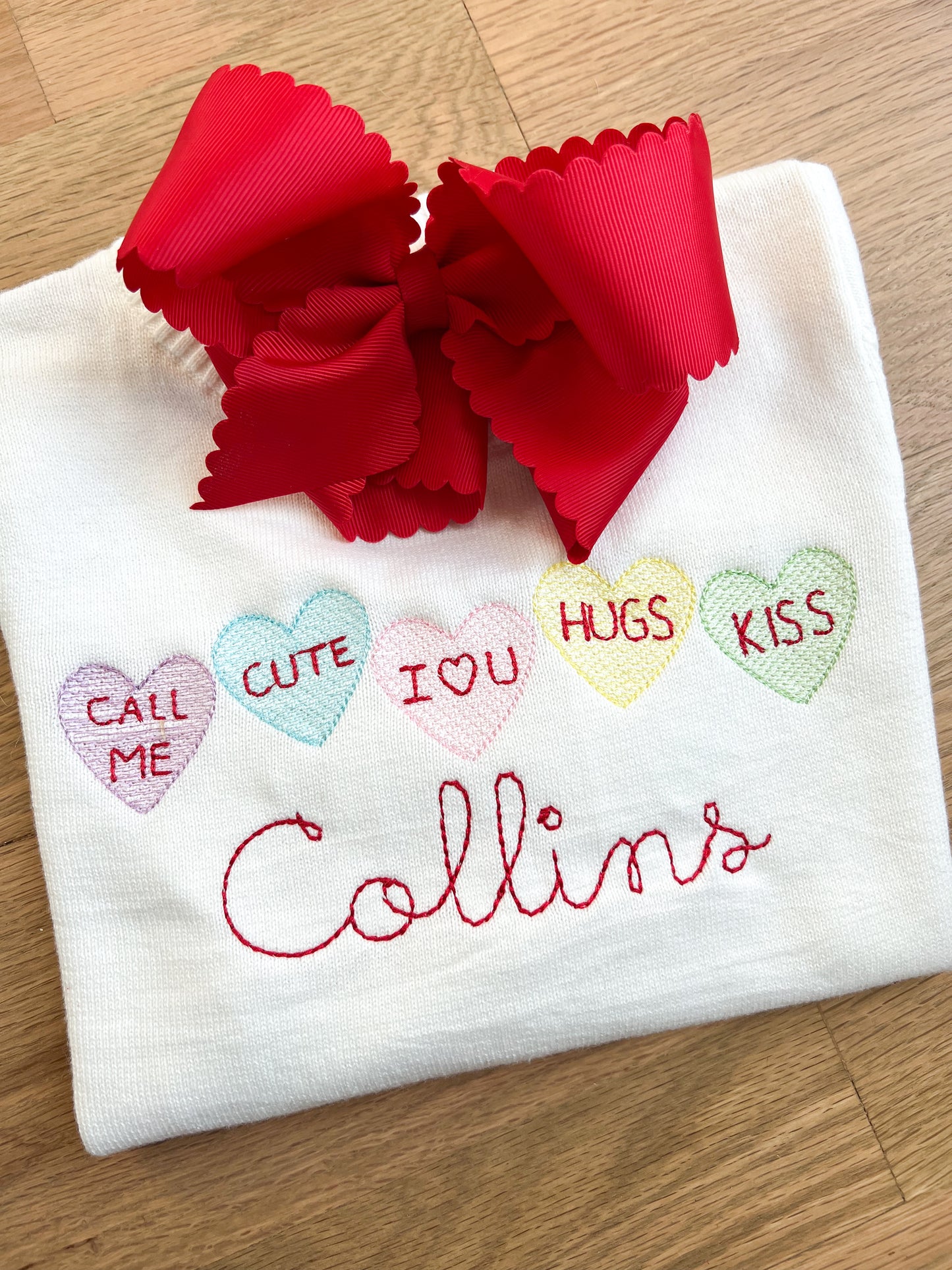 Conversation hearts monogram sweater