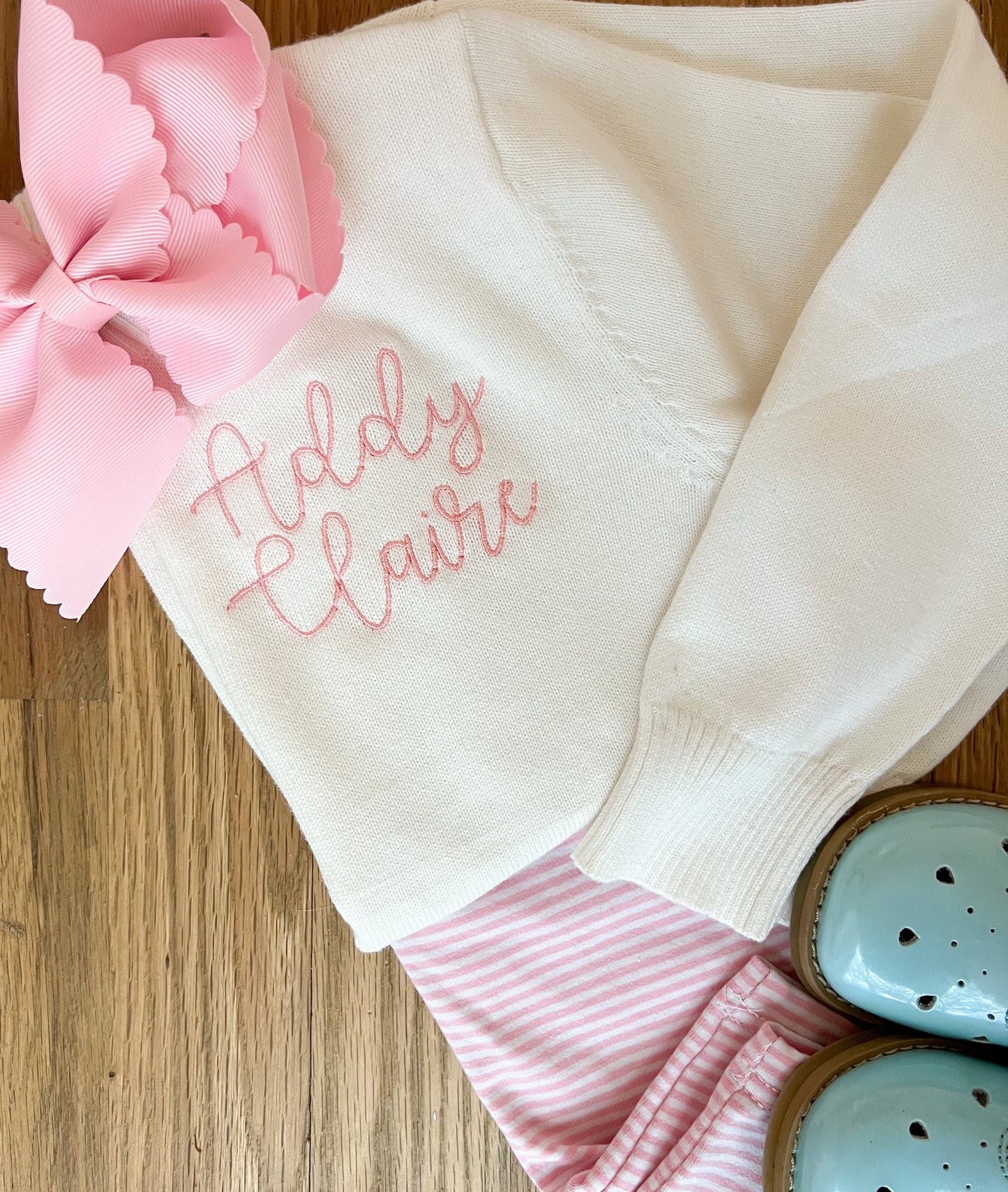 White cardigan with monogram