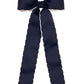 Navy bow with white trim