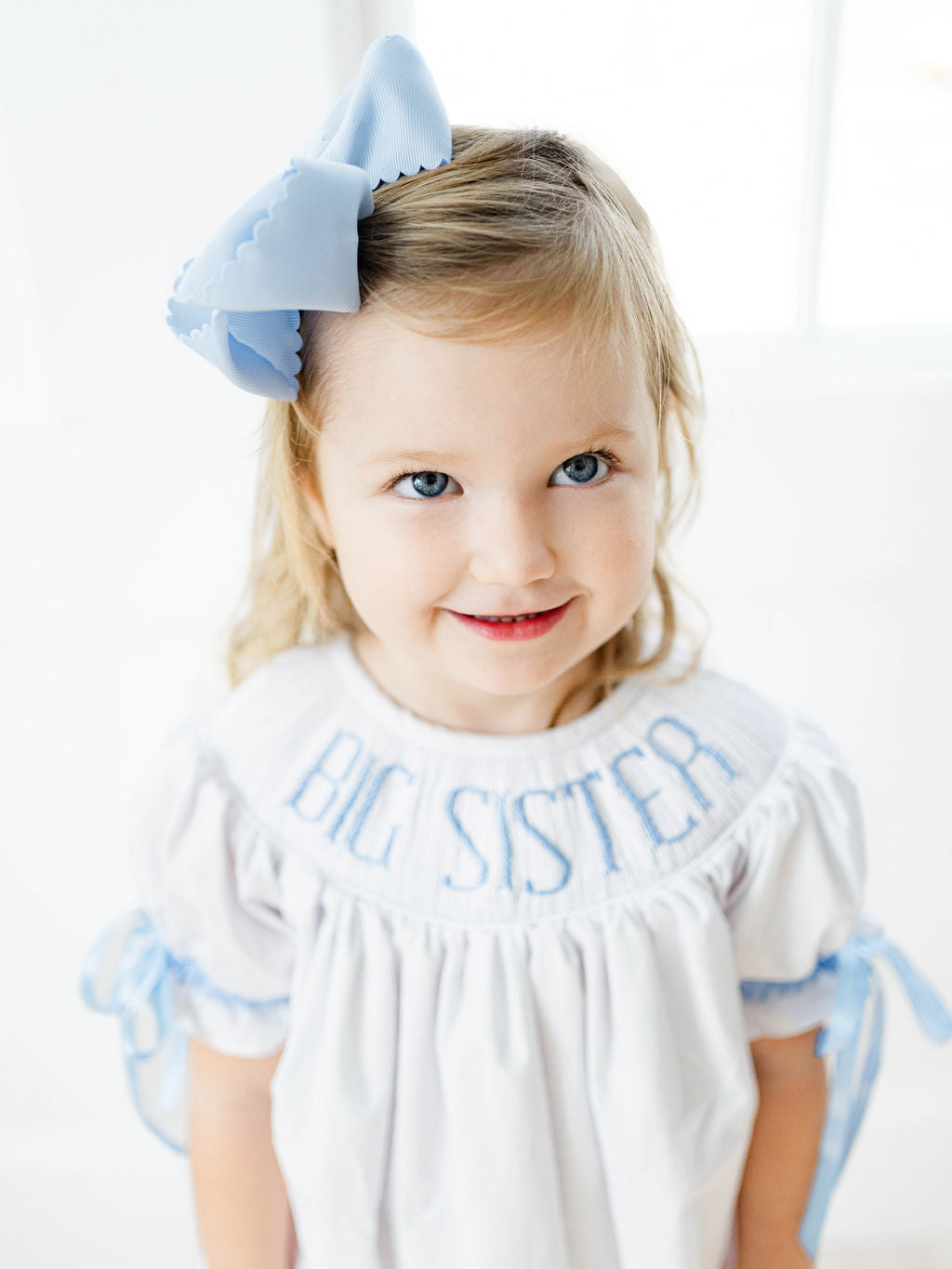 Blue big sister hand smocked dress