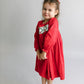 Red hand smocked wreath dress