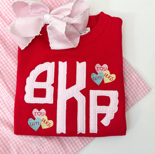 Appliqué conversation hearts monogram sweater