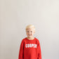 Red roll neck sweater