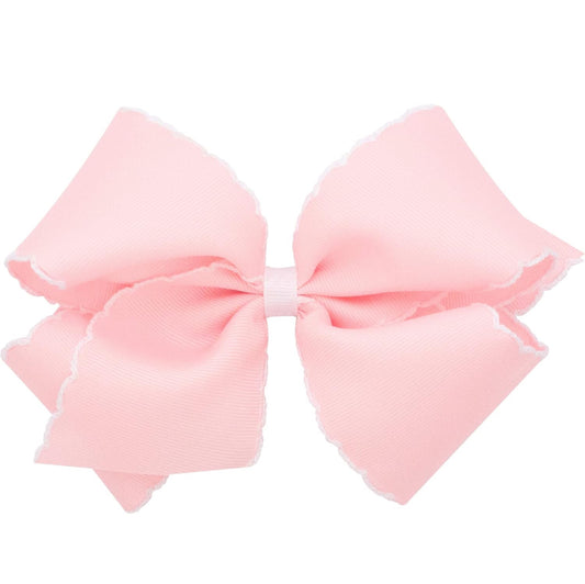 Pink bow white stitch