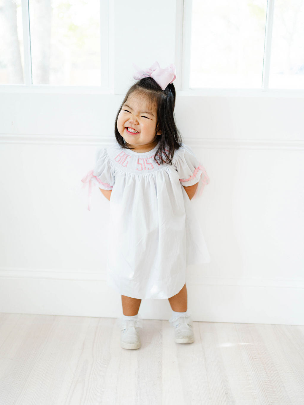 Pink big sister hand smocked dress