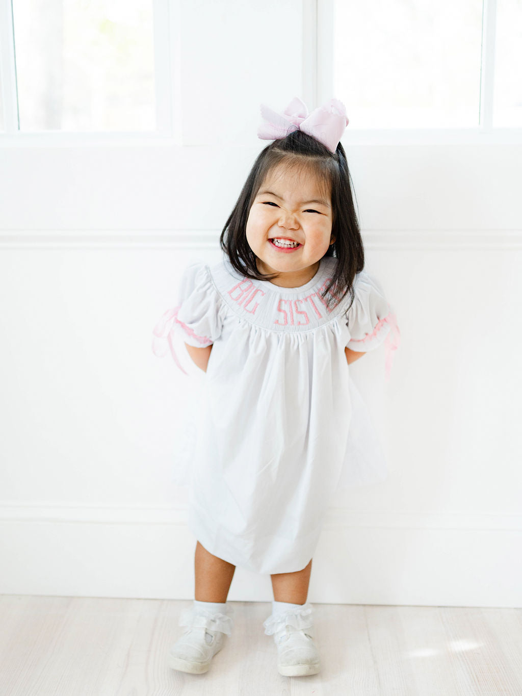 Pink big sister hand smocked dress