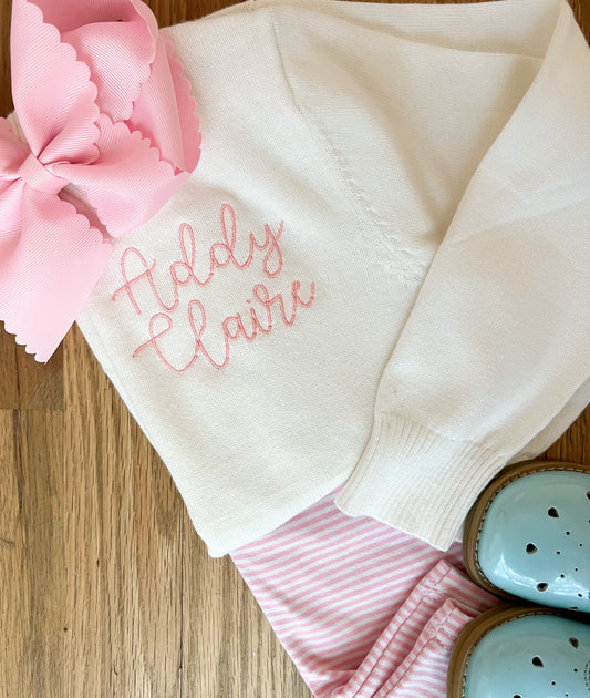 White cardigan with monogram