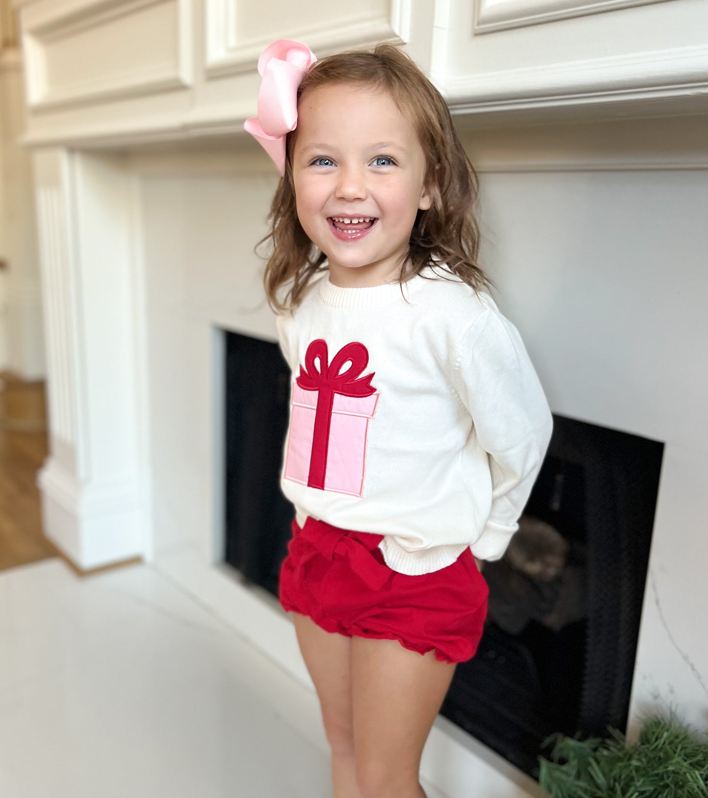 Pink and red sweater