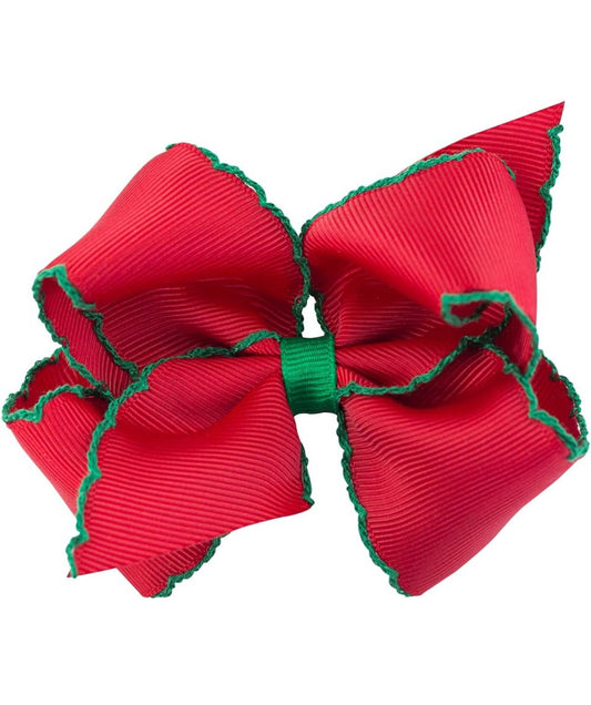 Red bow with green stitch