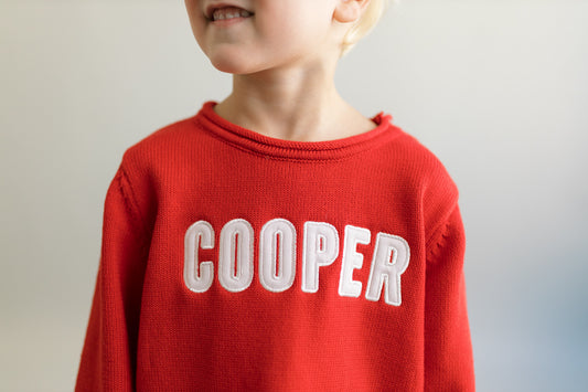 Red roll neck sweater