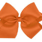 Orange 6” scalloped bow